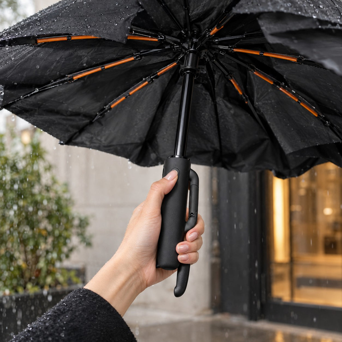 Un seul bouton sur la poignée pour ouvrir le parapluie